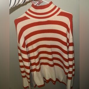 GUC medium flat white orange striped side slit turtleneck sweater